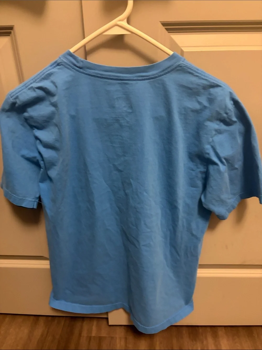 Nike Light Blue Tee with Striped White & Red Logo